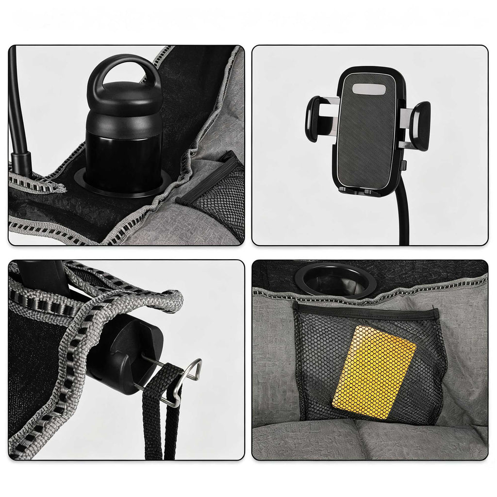 Oversized black and gray folding camping chair opened at a lakeside campsite